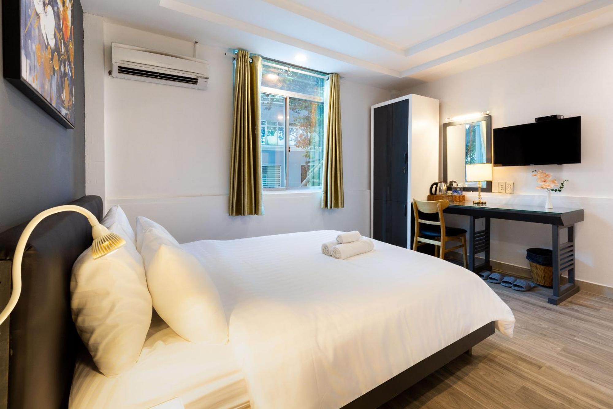 The Grand Apec Hotel & Spa Hô Chi Minh-Ville Extérieur photo